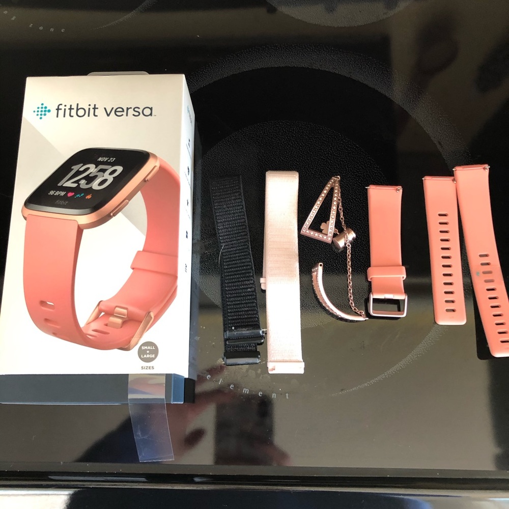 Fitbit Versa Rose Gold watch with extra bands!